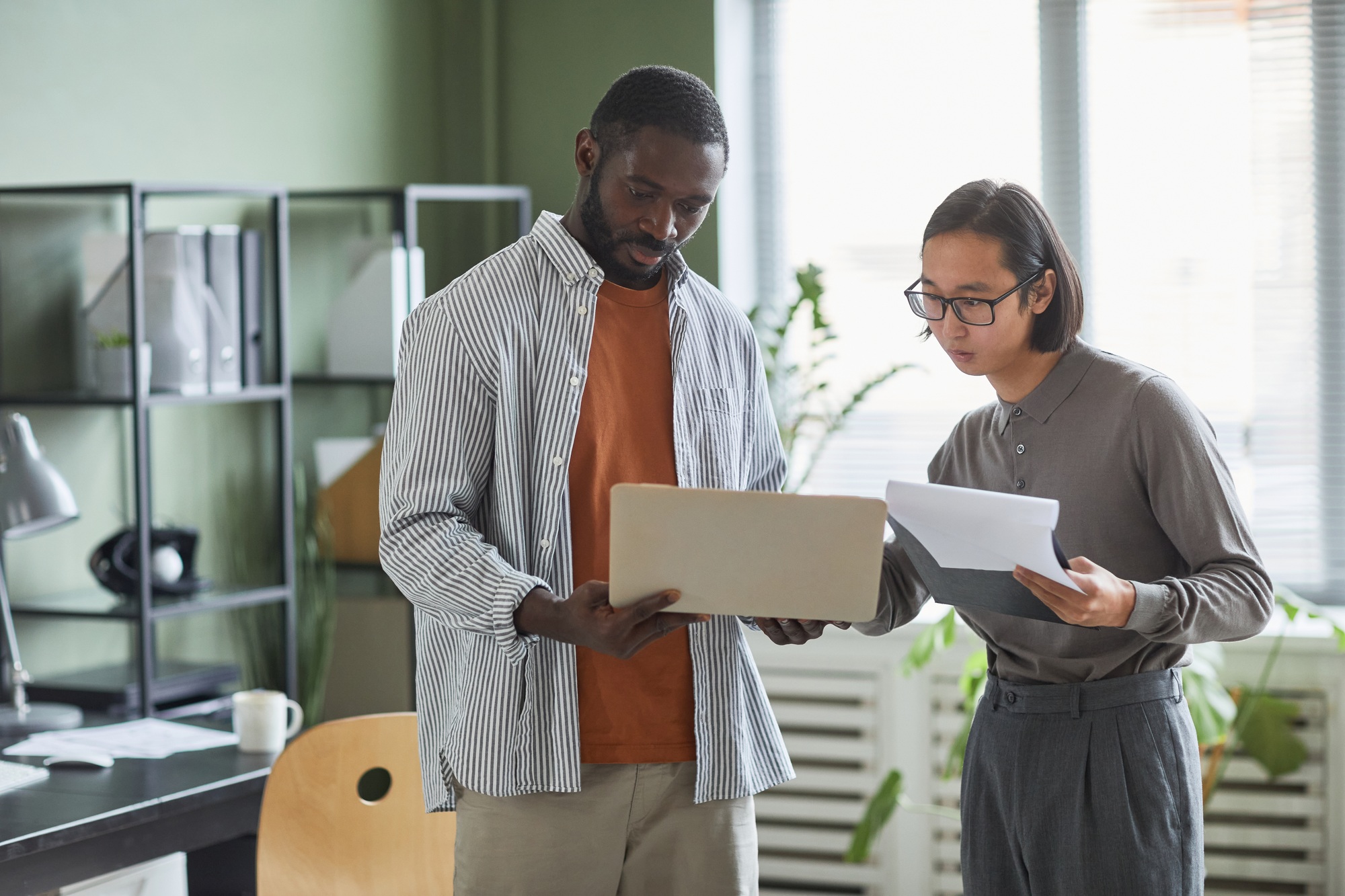 Two People Consulting in Office