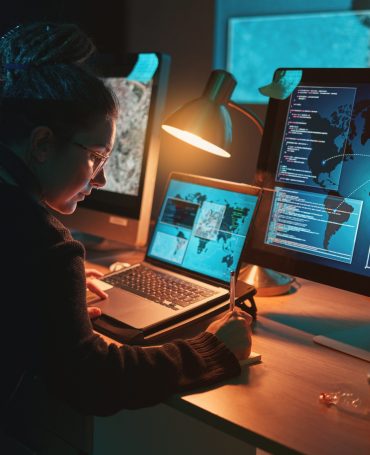 Cybersecurity, woman and writing global location info with map graphic for phishing and hacker data